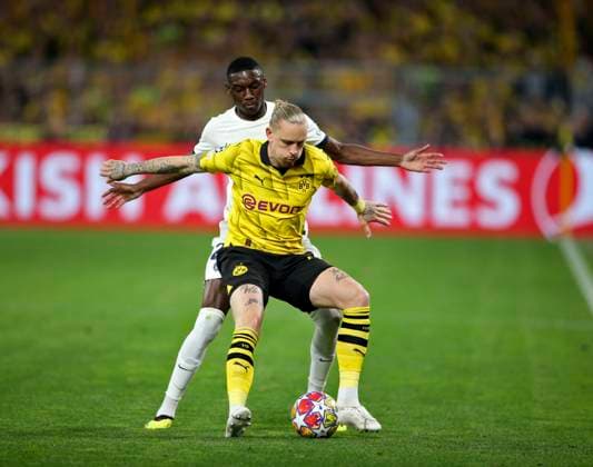 01 05 2024, Football UEFA Champions League 2023 2024, Semifinal, Borussia Dortmund FC Paris Saint Germain at Signal Iduna Park Dortmund hi Randal Kolo Muani Paris Saint Germain vs Marius Wolf front, Borussia Dortmund DFL and DFB regulations prohibit any use of photographs as image sequences and or quasi video