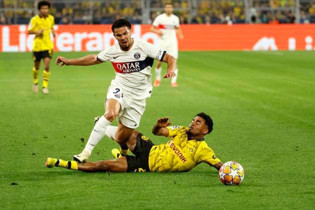 (240502) -- DORTMUND, May 2, 2024 -- Ian Maatsen (R) of Borussia Dortmund vies with Warren Zaire-Emery of Paris Saint-Germain during the UEFA Champions League semi-final first leg football match between Borussia Dortmund and Paris Saint-Germain in Dortmund, Germany, May 1, 2024. (Photo by Xinhua) (SP)GERMANY-DORTMUND-FOOTBALL-UEFA CHAMPIONS LEAGUE-DORTMUND VS PSG JoachimxBywaletz 