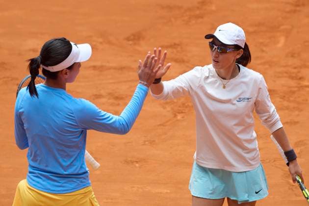 MADRID, SPAIN - MAY 01: Wang Xinyu and Zheng Saisai of China react in the Women s Doubles Quarterfinals match against Cristina Bucsa and Sara Sorribes Tormo of Spain on day nine of Mutua Madrid Open 2024 at La Caja Magica on May 1, 2024 in Madrid, Spain.  Copyright: xVCGx 111493935005