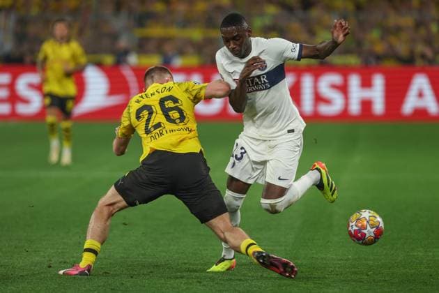 Champions League Borussia Dortmund Paris Saint Germain on 01 05 2024 at Signal Iduna Park in Dortmund Julian Ryerson Dortmund 26 vs Randal Kolo Muani Paris Saint Germain 23 MH