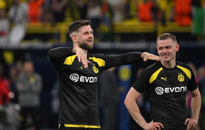 Niclas Füllkrug Borussia Dortmund celebrates the victory, right Julian Ryerson Borussia Dortmund 01 05 2024, Football Champions League, 2023 2024 season, semi-final first leg, Borussia Dortmund Paris St Germain 1 0 Dortmund Signal Iduna Park Nordrhein Westfalen Germany Team2