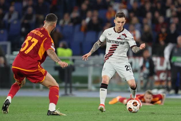 Rome, Italy 2.05.2024: Alejandro Grimaldo of Leverkusen , Rick Kasdorp of Roma during the UEFA Europa League 2023-2024, semi-finals leg 1, football match between AS Roma vs Bayer 04 Leverkusen FuSsball at Olympic Stadium in Rome.  Copyright: xMarcoxIacobucci IPAxSportx xipa-x xx IPA_45675937 IPA_Agency_IPA45675937