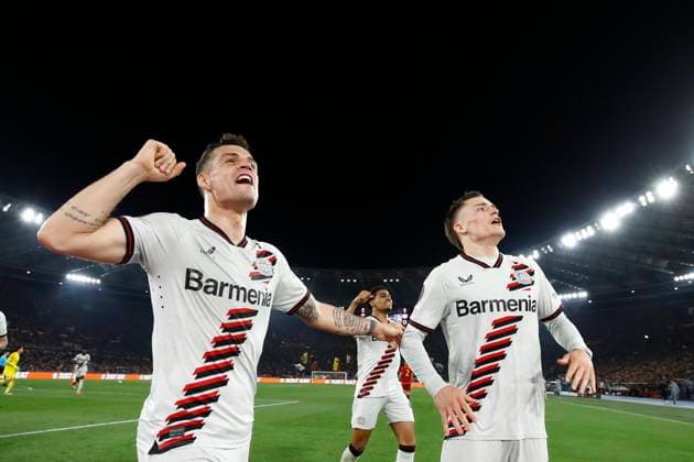 Florian Wirtz (Bayer 04 Leverkusen) celebrates with Granit Xhaka (Bayer 04 Leverkusen) after scoring his team s first goal, UEFA Europa League 2023 2024 - Semifinals first leg, AS Roma vs Bayer 04 Leverkusen, Olimpico Stadium, May 2, 2024, Rome, Italy.