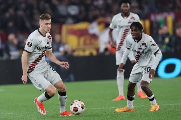 UEFA Europa League 2023-2024 - Semi-finals leg 1, AS Roma vs Bayer 04 Leverkusen Fußball at Olympic Stadium in Rome on 02th may 2024 Rome, Italy 2.05.2024: Josip Stanisic of Leverkusen, Jeremie Frimpong of Leverkusen during the UEFA Europa League 2023-2024, semi-finals leg 1, football match between AS Roma vs Bayer 04 Leverkusen Fußball at Olympic Stadium in Rome. Rome Olympic italy italy Copyright: xmarcoxiacobucci