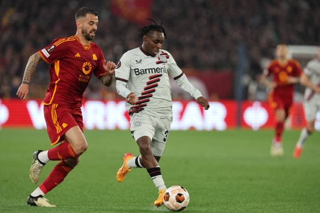 Football Europa League match - AS Roma vs Bayer 04 Leverkusen Rome, Italy 2.05.2024: Leonardo Spinazzola of Roma, Jeremie Frimpong of Leverkusen during the UEFA Europa League 2023-2024, semi-finals leg 1, football match between AS Roma vs Bayer 04 Leverkusen FuSsball at Olympic Stadium in Rome. Rome Italy  Copyright: xIPAxSport ABACAx