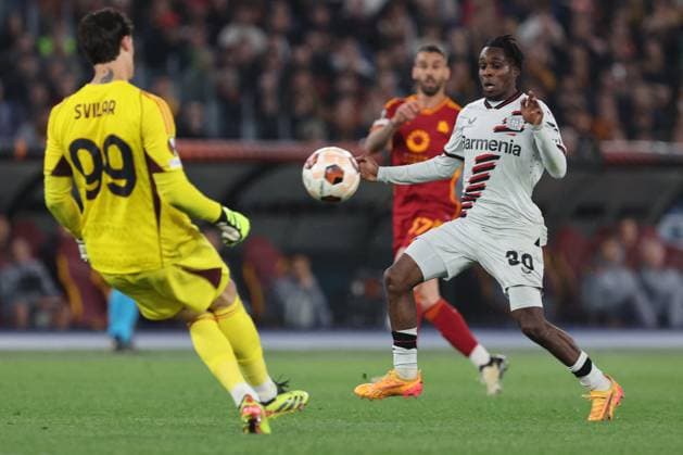 Football Europa League match - AS Roma vs Bayer 04 Leverkusen Rome, Italy 2.05.2024: Jeremie Frimpong of Leverkusen, Mile Svilar of Roma during the UEFA Europa League 2023-2024, semi-finals leg 1, football match between AS Roma vs Bayer 04 Leverkusen FuSsball at Olympic Stadium in Rome. Rome Italy  Copyright: xIPAxSport ABACAx