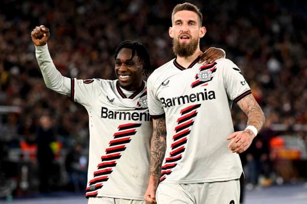 Robert Andrich of Bayer Leverkusen (r) celebrates with Jeremie Frimpong after scoring the goal of 0-2 during the Europa League football match between AS Roma and Bayer Leverkusen at Olimpico stadium in Rome (Italy), May 2nd, 2024. AndreaxStaccioli