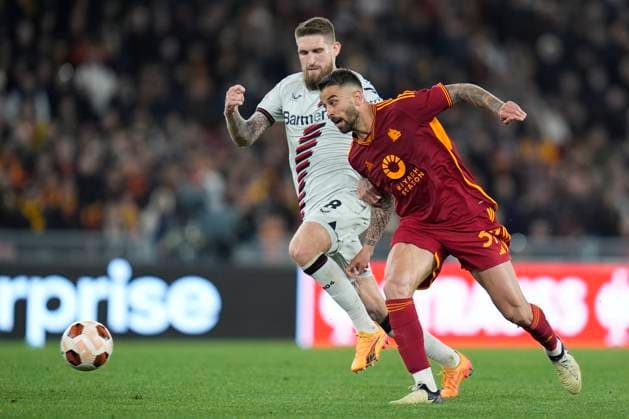 Leonardo Spinazzola of AS Roma competes for the ball with Robert Andrich of Bayer Leverkusen during the UEFA Europa League match between AS Roma and Bayer Leverkusen at Stadio Olimpico Rome Italy on 02 May 2024. Rome Stadio Olimpico Rome Italy Copyright: xPhotoxSportxPicsx SP24-929-049