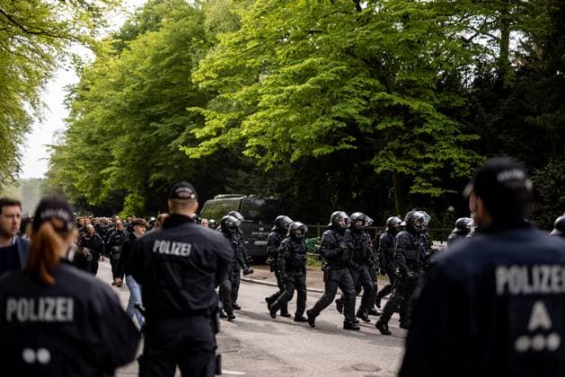 Hamburg, 3 May 2024 Football, 2 Bundesliga 2023 24, Hamburger SV FC St Pauli Fans of FC St Pauli march under police supervision into Hamburgs Volksparkstadion DFL REGULATES PROHIBIT ANY USE OF PHOTOGRAPHS AS IMAGE SEQUENCES AND OR QUASI VIDEO