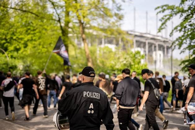 Hamburg, 3 May 2024 Football, 2 Bundesliga 2023 24, Hamburger SV FC St Pauli Fans of FC St Pauli march under police supervision into Hamburgs Volksparkstadion DFL REGULATES PROHIBIT ANY USE OF PHOTOGRAPHS AS IMAGE SEQUENCES AND OR QUASI VIDEO