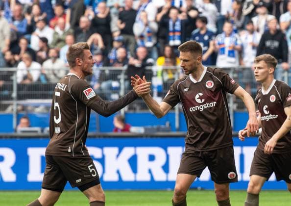 Soccer, Men, Season 2023 2024, 2 Bundesliga 32 Matchday , Hamburger SV FC St Pauli, v l Hauke Wahl FC St Pauli , Karol Mets FC St Pauli , 03 05 2024, Copyright: xSebastianxRäppold MatthiasxKochx