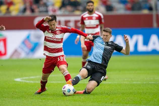 Soccer 2 Bundesliga, Season 2023 2024, Matchday 32, Fortuna Duesseldorf 1 FC Nuernberg on 03 05 2024 in the Merkur Spiel Arena in Duesseldorf duel between Shinta Appelkamp Fortuna Duesseldorf, 23 and Florian Flick 1 FC Nuernberg, 06 Important note In accordance with the regulations of the DFL German Football League and the DFB German Football Association, it is prohibited to utilize or have utilized photographs taken in the stadium and or of the match in the form of sequential images and or video-like photo series Foto Kirchner Media TH Copyright: xKirchner-Media THx