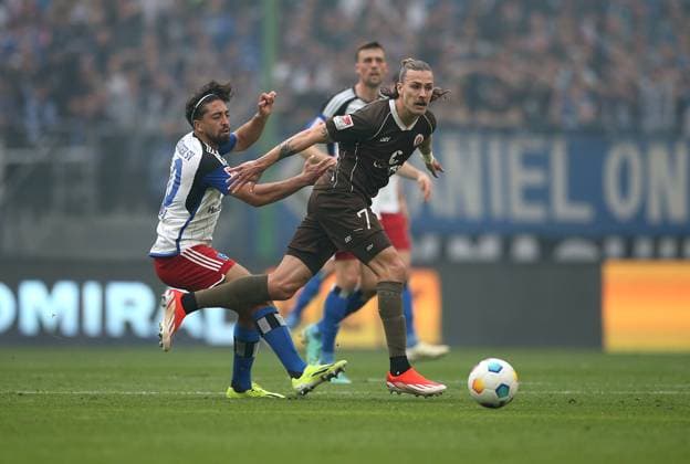 03 05 2024, Soccer 2 Bundesliga 2023 2024, Matchday 32, Hamburger SV FC St Pauli , at Volksparkstadion Hamburg L R Immanuel Pherai Hamburg vs Jackson Irvine FC St Pauli DFL and DFB regulations prohibit any use of photographs as image sequences and or quasi video