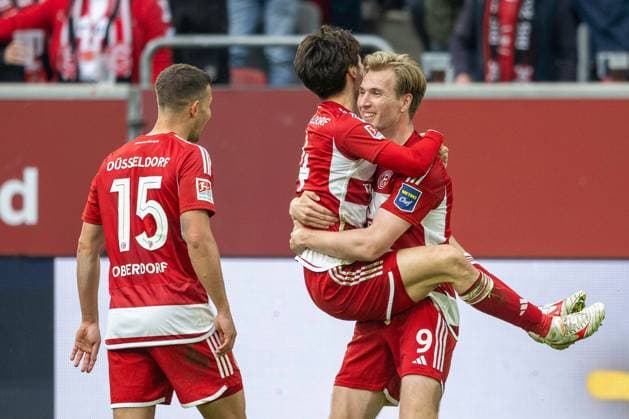 Soccer 2 Bundesliga, Season 2023 2024, Matchday 32, Fortuna Duesseldorf 1 FC Nuernberg on 03 05 2024 at the Merkur Spiel Arena in Duesseldorf Ao Tanaka Fortuna Duesseldorf, 04 has jumped on the cheering Vincent Vermeij Fortuna Duesseldorf, 09 In front of Tim Oberdorf Fortuna Duesseldorf, 15 Important note According to the regulations of the DFL German Football League and the DFB German Football Association, it is prohibited to utilize or have utilized photographs taken in the stadium and or of the match in the form of sequential images and or video-like photo series Foto Kirchner Media TH Copyright: xKirchner-Media THx