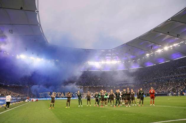 Photo Loser St Puali bid farewell to fans shrouded in blue mist Football 2 Bundesliga on Fri 03 05 2024 Hamburger SV FC St Pauli 1 0