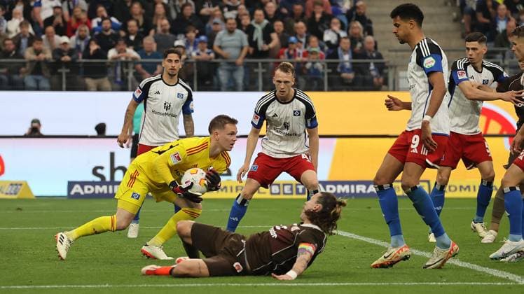 Goalkeeper Matheo Raab HSV ahead of Jackson Irvine FC St Pauli Football, Men, Season 2023 2024, 2 BL, Volksparkstadion, Hamburger SV vs FC St Pauli, City derby, 1 0, Derby winner HSV DFL REGULATIONS PROHIBIT ANY USE OF PHOTOGRAPHS AS IMAGE SEQUENCES AND OR QUASI VIDEO
