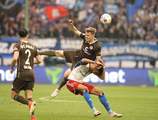 Photo Scorer Robert Glatzel HSV goes down against David Nemeth Pauli Soccer 2 Bundesliga on Fri 03 05 2024 Hamburger SV FC St Pauli 1 0