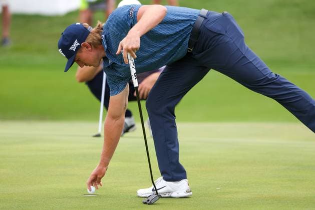 MCKINNEY, TX - MAY 03: Jake Knapp (USA) reaches into the cup to pull out his ball after a birdie on the 16th green during the second round of the PGA, Golf Herren CJ CUP Byron Nelson on May 3, 2024, at TPC Craig Ranch in McKinney, TX. (Photo by David Buono Icon Sportswire) GOLF: MAY 03 PGA CJ CUP Byron Nelson EDITORIAL USE ONLY Icon240503062