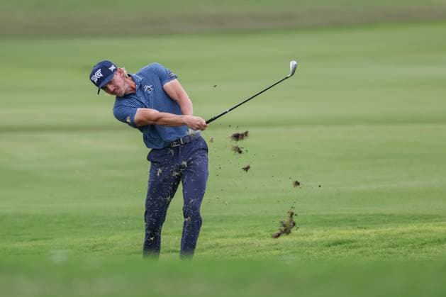 MCKINNEY, TX - MAY 03: Jake Knapp (USA) takes a large divot throwing grass into the air on this approach shot on the 18th hole during the second round of the PGA, Golf Herren CJ CUP Byron Nelson on May 3, 2024, at TPC Craig Ranch in McKinney, TX. (Photo by David Buono Icon Sportswire) GOLF: MAY 03 PGA CJ CUP Byron Nelson EDITORIAL USE ONLY Icon240503073