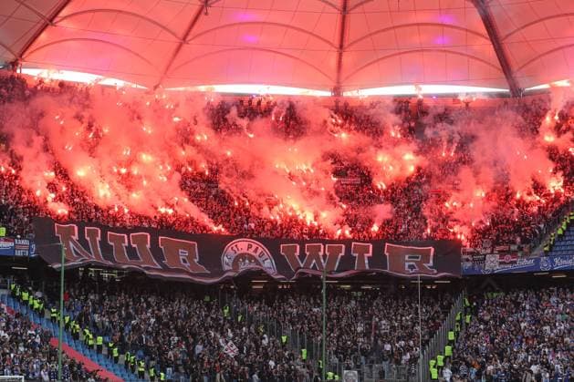2 Bundesliga Hamburger SV FC St Pauli on 03 05 2024 at Volksparkstadion in Hamburg The fans of FC St Pauli set off pyrotechnics in the visitors block and present a banner banner saying only we MH