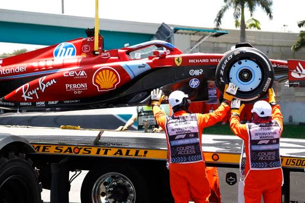 MIAMI GARDENS, FL - MAY 03: A crane picks up the race car of Scuderia Ferrari driver Charles Leclerc 16 of Monaco in turn 15 during practice for the F1 Crypto.com Miami Grand Prix on May 3, 2024 at Miami International Autodrome in Miami Gardens, FL. (Photo by Jeff Robinson Icon Sportswire) AUTO: MAY 03 F1 Crypto.com Miami Grand Prix EDITORIAL USE ONLY Icon24050338341