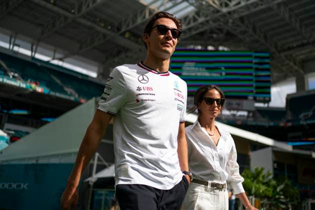 British Formula One driver George Russell of Mercedes-AMG Petronas and Carmen Montero Mundt arrive to the paddock during the Formula One Miami Grand Prix at the Miami International Autodrome in Miami Gardens, Florida on Saturday, May 4, 2024  MIA20240504408 GREGxNASH