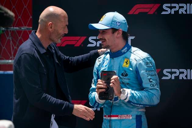 Retired French professional footballer Zinedine Zidane greets Monaco s Formula One driver Charles Leclerc of Scuderia Ferrari following his second place in the sprint race during the Formula One Miami Grand Prix at the Miami International Autodrome in Miami Gardens, Florida on Saturday, May 4, 2024  MIA20240504443 GREGxNASH