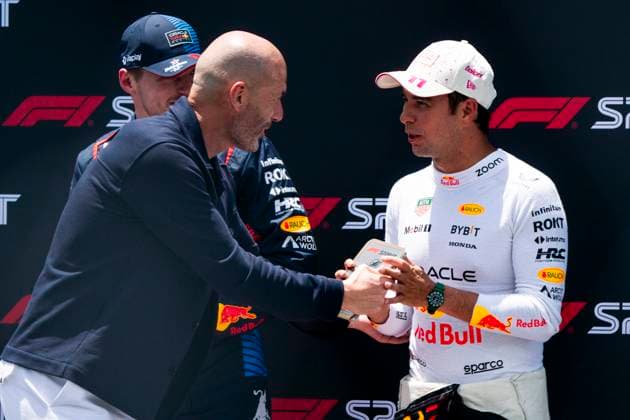 Retired French professional footballer Zinedine Zidane presents a plaque Mexican Formula One driver Sergio Pérez of Red Bull Racing for finishing third in the sprint race during the Formula One Miami Grand Prix at the Miami International Autodrome in Miami Gardens, Florida on Saturday, May 4, 2024  MIA20240504444 GREGxNASH