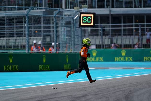 May 4, 2024, Miami, Florida, USA: 4 McLaren F1 Team, Lando Norris (GBR) runs across the track after crashing on the opening lap of the Sprint Race.at the Formula 1 Crypto.com Miami Grand Prix in Miami, Florida. Max Verstappen won the race. Miami USA - ZUMAd212 20240504_zsp_d212_020 Copyright: xRichardxDolex