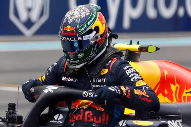 MIAMI GARDENS, FL - MAY 04: Oracle Red Bull Racing driver Sergio Perez 11 of Mexico climbs from his race car after the running of the F1 Sprint Race on May 4, 2024 at the Miami International Autodrome in Miami Gardens, FL. (Photo by Jeff Robinson Icon Sportswire) AUTO: MAY 04 F1 Crypto.com Miami Grand Prix EDITORIAL USE ONLY Icon24050419011
