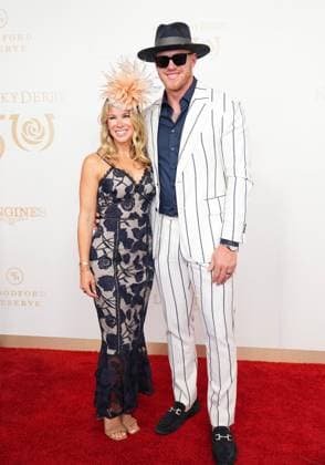LOUISVILLE, KY - MAY 04: Former NFL, American Football Herren, USA player Kyle Rudolph and his wife Jordan walk the red carpet before the 150th running of the Kentucky Derby on May 4, 2024, at Churchill Downs in Louisville, Ky. (Photo by Jeff Moreland Icon Sportswire) HORSE RACING: MAY 04 Kentucky Derby EDITORIAL USE ONLY Icon168240504026