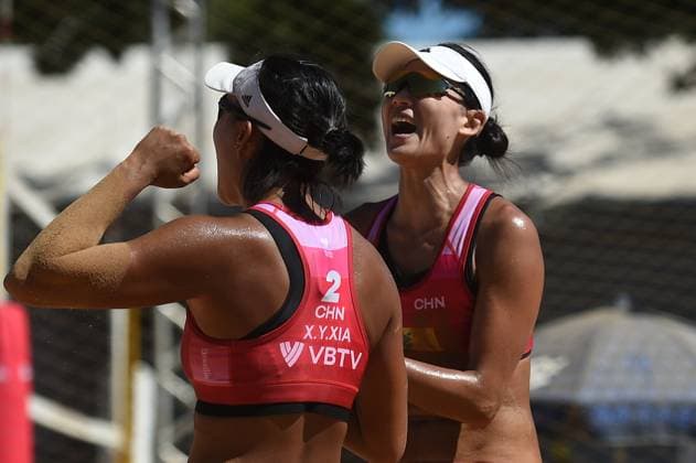 (240505) -- BRASILIA, May 5, 2024 -- Xue Chen (R) Xia Xinyi of China celebrate victory after the round of 16 match between Xue Chen Xia Xinyi of China and Tina Graudina Anastasija Samoilova of Latvia at the Volleyball World Beach Pro Tour Elite 16 2024 in Brasilia, Brazil, May 4, 2024. (Photo by Xinhua) (SP)BRAZIL-BRASILIA Beach volleyball, Beachvolleyball PRO TOUR-WOMEN-CHN VS LAT LucioxTavora 