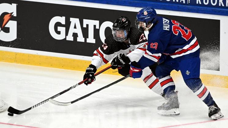 Carson Wetsch (L) of Canada vies with Cole Hutson of USA during the 2024 IIHF Ice hockey, Eishockey U18 world championships final match between the United States and Canada in Espoo, Finland, on May 5, 2024. Espoo Finland LKFTJ20240505181637AVDN  Copyright: xJussixNukarix LKFTJ20240505181637AVDN