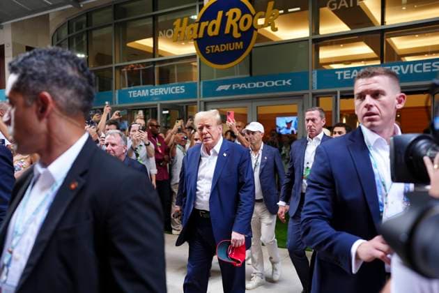 May 5, 2024, Miami, Florida, USA: Former President Donald Trump walks through the paddock on his way into the Team McLaren Formula 1 garage prior to the start of the Formula 1 Crypto.com Miami Grand Prix in Miami, Florida Miami USA - ZUMAd212 20240505_zsp_d212_002 Copyright: xRichardxDolex
