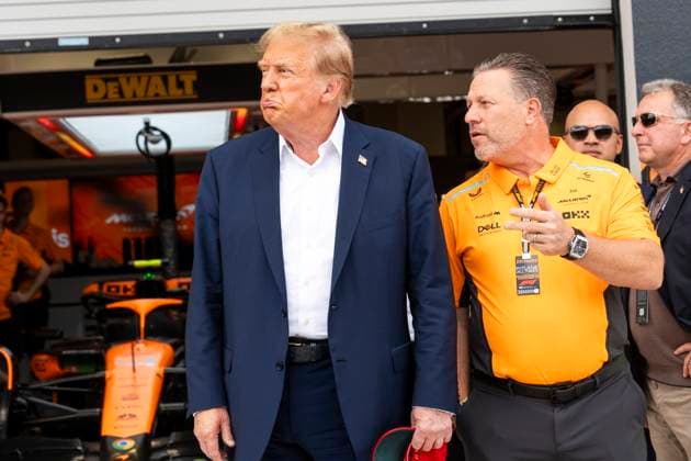 Former U.S. President Donald Trump speaks with McLaren F1 Team CEO Zak Brown as he visits the garage during the Formula One Miami Grand Prix at the Miami International Autodrome in Miami Gardens, Florida on Sunday, May 5, 2024  MIA20240505425 GREGxNASH