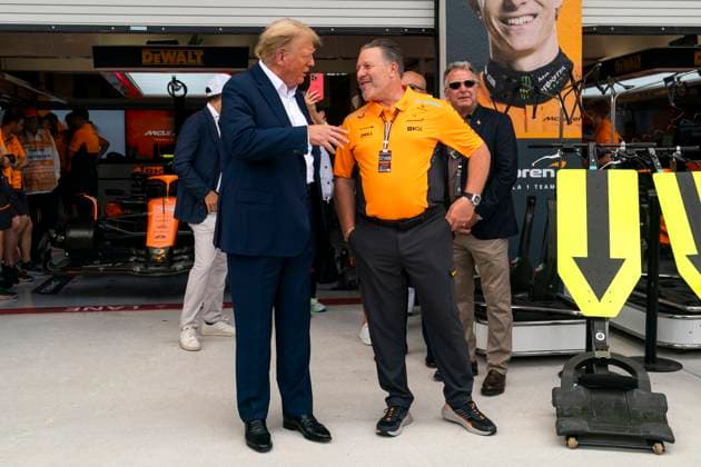 Former U.S. President Donald Trump speaks with McLaren F1 Team CEO Zak Brown as he visits the garage during the Formula One Miami Grand Prix at the Miami International Autodrome in Miami Gardens, Florida on Sunday, May 5, 2024  MIA20240505424 GREGxNASH