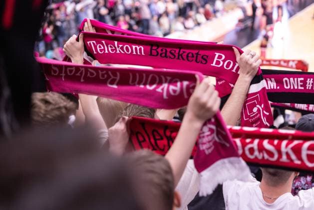 Fans with scarves before the game Telekom Baskets Bonn vs Würzburg Baskets BBL season 2023 2024 32 matchday