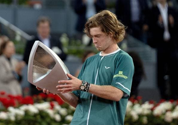 Andrey Rublev of Russia celebrates with the trophy Mutua Madrid Open, Day 14, Tennis, La Caja Magica, Madrid, Spain - 05 May 2024  Copyright: xEllaxLing Shutterstockx 14455444b