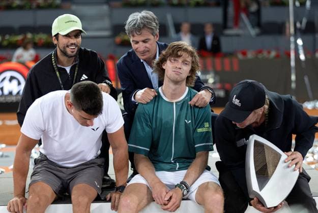 Andrey Rublev of Russia celebrates with the trophy and his team Mutua Madrid Open, Day 14, Tennis, La Caja Magica, Madrid, Spain - 05 May 2024  Copyright: xEllaxLing Shutterstockx 14455444a