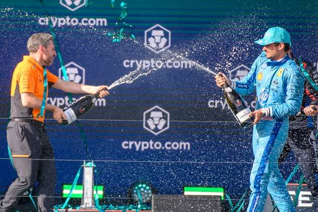 5th May 2024; Miami International Autodrome, Miami, Florida, USA; Formula 1 Crypto.com Miami Grand Prix 2024; Race Day; Scuderia Ferrari driver Charles Leclerc of Monaco and McLaren team principal Andrea Stella spray each other with champagne as they celebrate on the podium.  ActionPlus12639309 DouglasxMurray