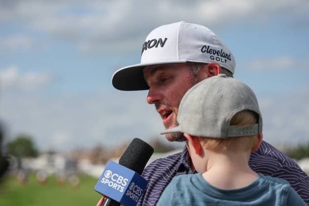 MCKINNEY, TX - MAY 05: Taylor Pendrith (CAN) is interviewed while holding his son after winning the PGA, Golf Herren CJ CUP Byron Nelson on May 5, 2024, at TPC Craig Ranch in McKinney, TX. (Photo by David Buono Icon Sportswire) GOLF: MAY 05 PGA CJ CUP Byron Nelson EDITORIAL USE ONLY Icon240505068