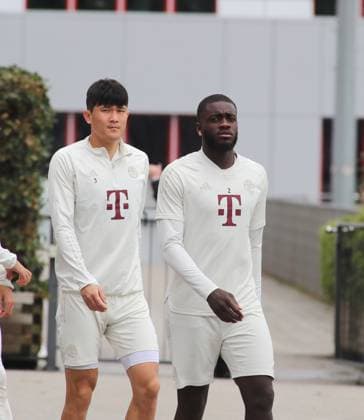 Munich, Germany 07 May 2024 Football, Men, Season 2023 2024, FC Bayern Munich, Säbener Strasse, Training ground, Final training, Champions League Minjae Kim, Min jae Kim FC Bayern Munich left with Dayot Upamecano FC Bayern Munich right head, upper body on the way to the training ground