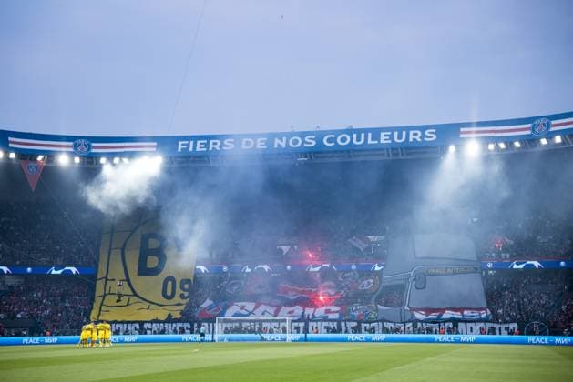 UEFA Champions League FC Paris Saint Germain Borussia Dortmund 07 05 2024 Choreography of the fans of FC Paris Saint Germain The Borussia Dortmund BVB logo in a wall that is burning and broken out of which a PSG FC Paris Saint Germain bus is driving UEFA Champions League FC Paris Saint Germain Borussia Dortmund , Paris, Parc des Princes Copyright: xBEAUTIFULxSPORTS Wunderlx