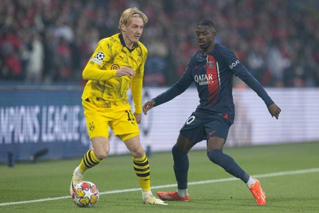 Julian Brandt of Borussia Dortmund under pressure from Ousmane Dembà là of Paris Saint-Germain Paris Saint-Germain v Borussia Dortmund, UEFA Champions League, Semi Final, Second Leg, Football, Parc des Princes, Paris, France - 07 May 2024 EDITORIAL USE ONLY No use with unauthorised audio, video, data, fixture lists, club league logos or live services. Online in-match use limited to 120 images, no video emulation. No use in betting, games or single club league player publications. Copyright: xPaulxCurrie Shutterstockx 14458453s