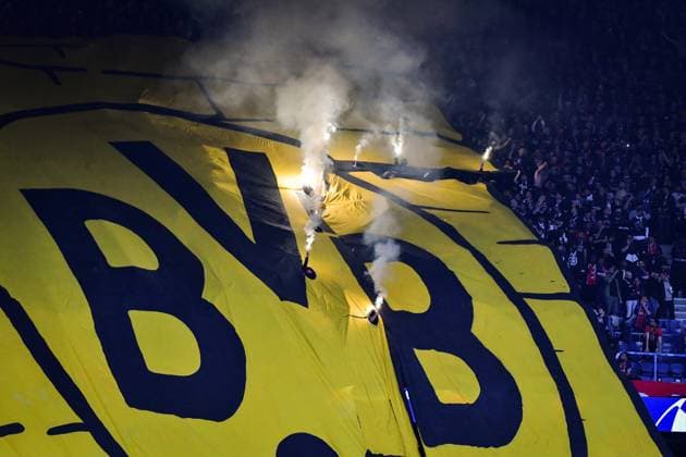 Champions League PSG vs Borussia Dortmund FA Paris Saint-Germain?s fans hold flares through Borussia Dortmund? logo during the UEFA Champions League semi-final football match between Paris Saint-Germain and Borussia Dortmund at the Parc des Princes stadium in Paris on May 7, 2024. Photo by Firas Abdullah ABACAPRESS.COM  Copyright: xAbdullahxFiras ABACAx