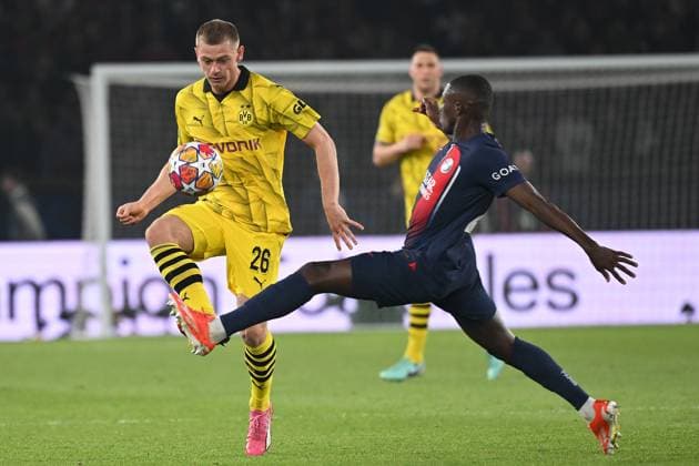 Paris, Parc des Princes, 07 05 24, GER, Men, UEFA Champions League, Semi-final, Season 2023 2024, Paris Saint Germain Borussia Dortmund Picture from left in duel Julian RYERSON Dortmund and NUNO MENDES Paris Only for editorial use UEFA regulations prohibit any use of photographs as image sequences and or quasi video France