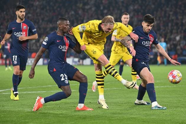 Paris, Parc des Princes, 07 05 24, GER, Men, UEFA Champions League, Semi-final, Season 2023 2024, Paris Saint Germain Borussia Dortmund Picture from left NUNO MENDES Paris , Julian BRANDT Dortmund and Lucas BERALDO Paris Only for editorial use UEFA regulations prohibit any use of photographs as image sequences and or quasi video France