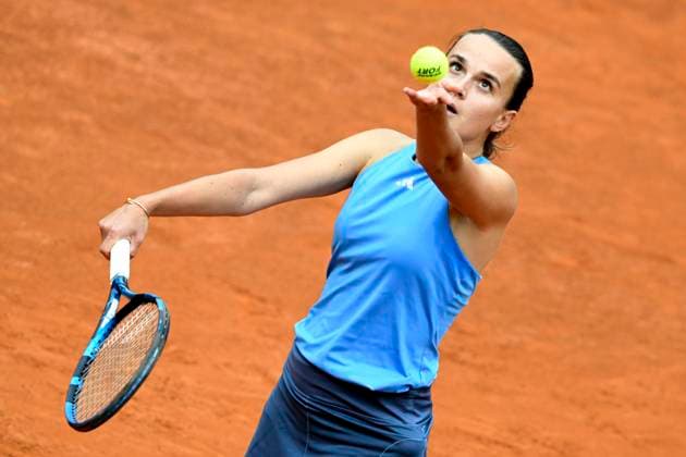 Clara Burel of France serves during the match against Naomi Osaka of United States of America at the Internazionali BNL d Italia 2024 tennis tournament at Foro Italico in Rome, Italy on May 8, 2024. Naomi Osaka defeated Clara Burel 7-6, 6-1. antoniettaxbaldassarre