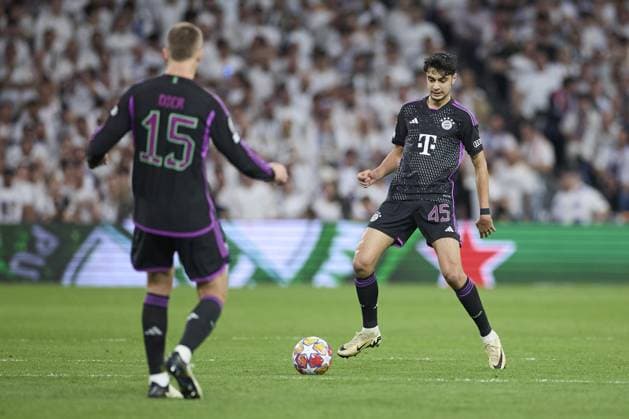 Aleksandar Pavlovic of FC Bayern Munich with the ball during the UEFA Champions League match between Real Madrid and Bayern Munich at Santiago Bernabeu Stadium on May 8, 2024 in Madrid, Spain. (Photo by: Ma de Gracia Jimenez) FOOTBALL : Real Madrid vs Bayern Munich- UEFA Champions League - 08 05 2024 LGM Panoramic 