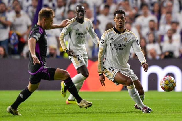 2024-05-08 Real Madrid v FC Bayern Munchen - Semi-final Second Leg - UEFA Champions League 2023 24 MADRID, SPAIN - MAY 8: Joshua Kimmich of FC Bayern Munchen battles for the ball with Jude Bellingham of Real Madrid during the Semi-final Second Leg - UEFA Champions League 2023 24 match between Real Madrid and FC Bayern Munchen at Estadio Santiago Bernabeu on May 8, 2024 in Madrid, Spain. (Photo by Pablo Morano BSR Agency) Madrid Spain Content not available for redistribution in The Netherlands directly or indirectly through any third parties. Copyright: xBSRxAgencyx